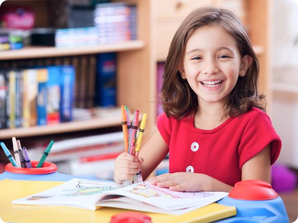 "Little ones enjoying playground activities at daycare"