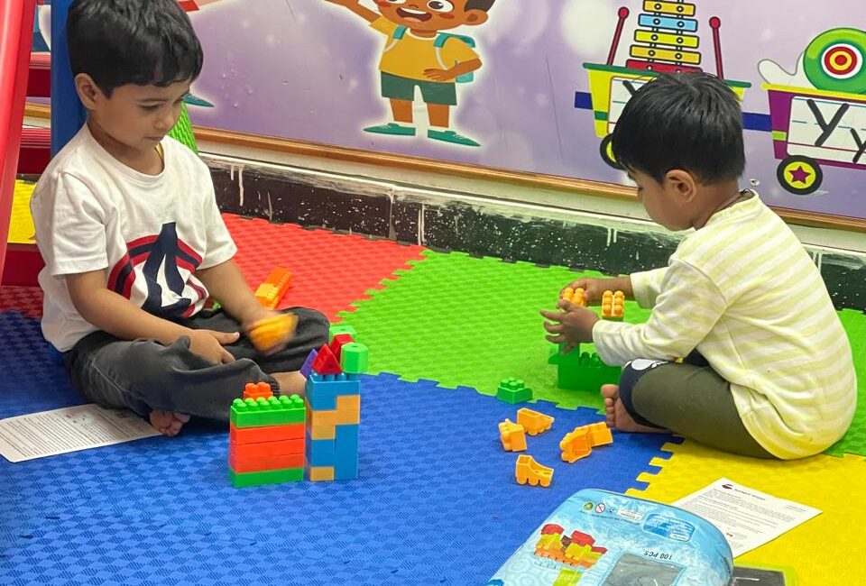 "Shape sorting activity for kids at Stepping Stone Day Care"