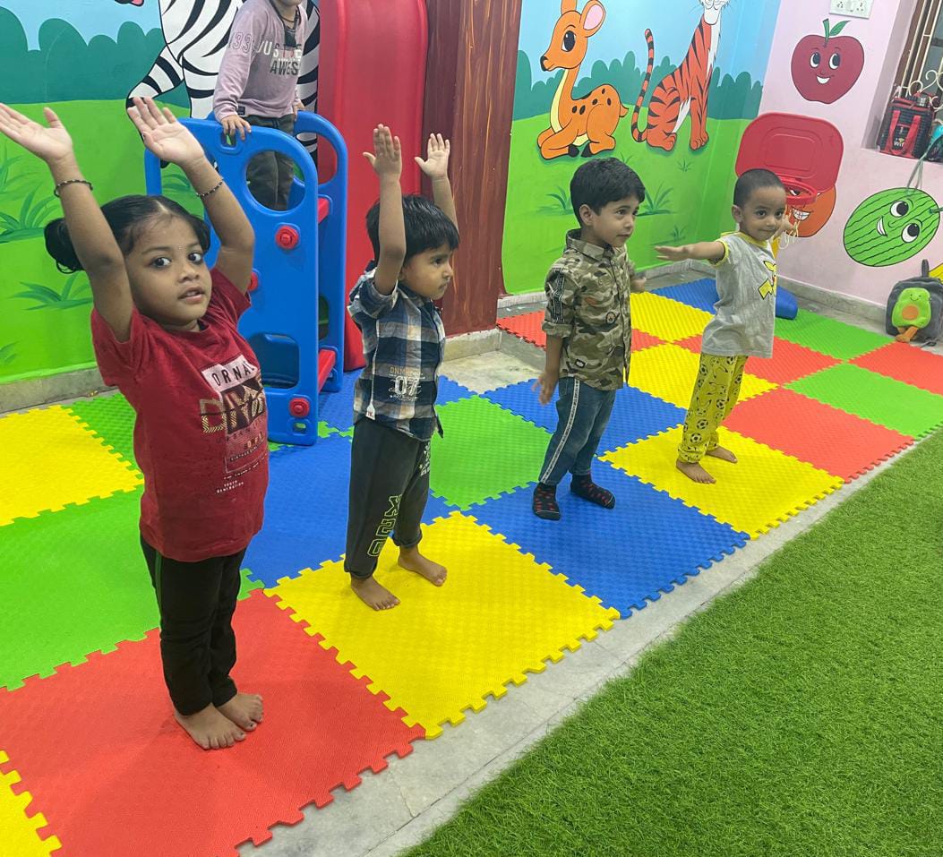 "Children playing with toys in daycare activity center"